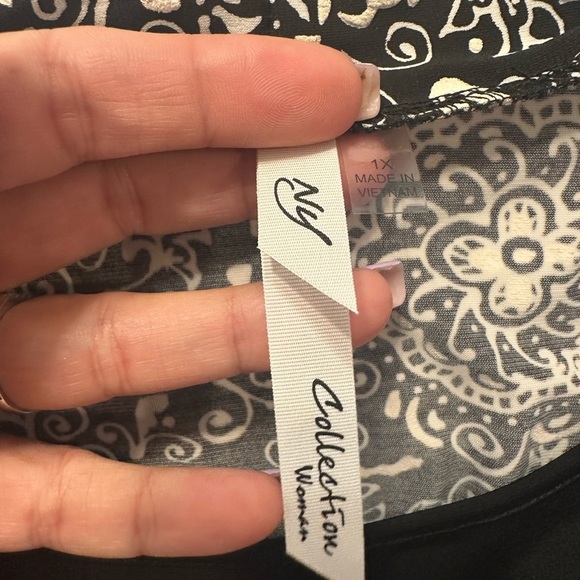 Elegant Black and White Blouse with Layered Design - Picture 6 of 11